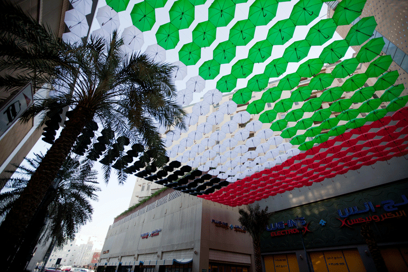 Umbrellas in UAE flag's colours at Dubai's Al Ghurair Centre.