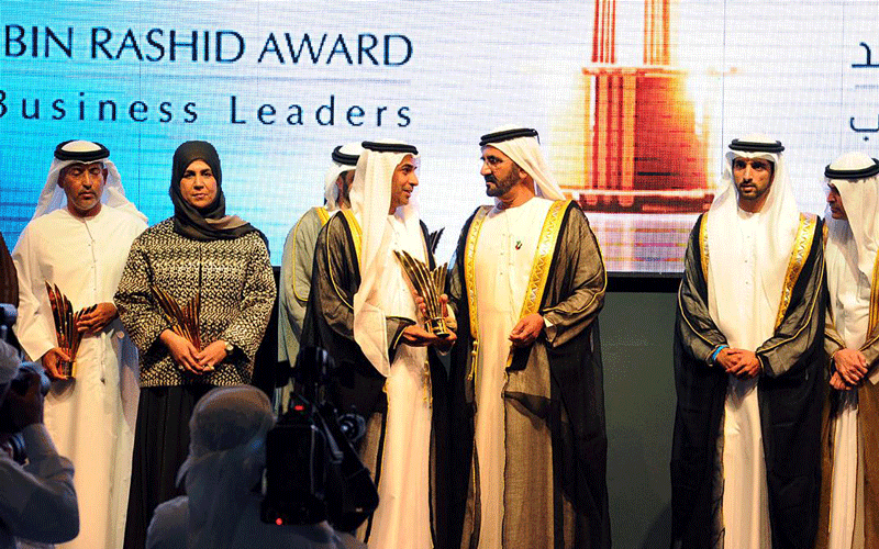 His Highness Sheikh Mohammed bin Rashid Al Maktoum presenting a business leader award to a winner. (Wam)