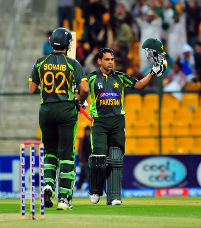 Pakistan's Mohammad Hafeez reacts after reaching his third century of the series against Pakistan in the fourth one-day international between Pakistan and Sri Lanka at Sheikh Zayed Cricket Stadium in Abu Dhabi on Wednesday. (KAMAL JAYAMANNE)