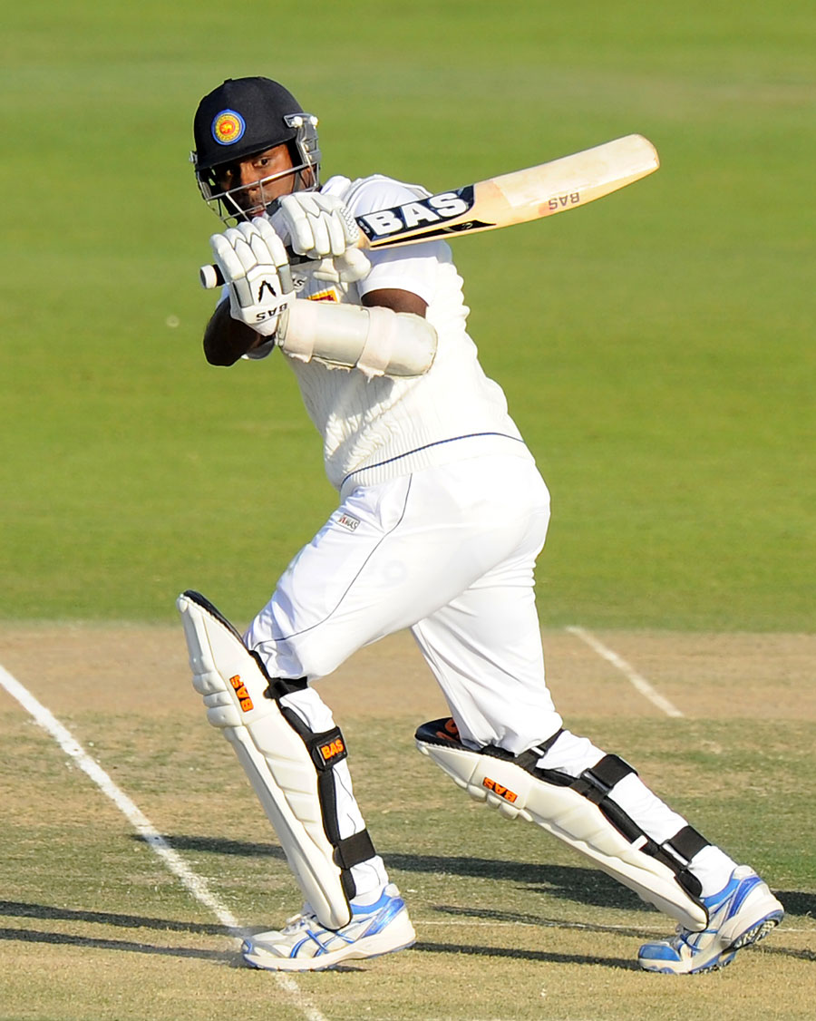 Sri Lankan batsman Angelo Mathews plays a shot during the opening day of the first Test between Pakistan and Sri Lanka at the Sheikh Zayed Cricket Stadium in Abu Dhabi on December 31, 2013. (AFP)