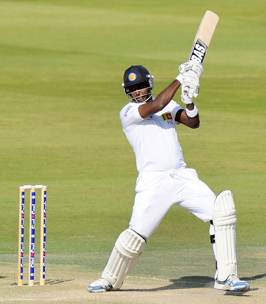 Sri Lanka captain Angelo Mathews led from the front by slamming a century on day four of the first Test against Pakistan at Sheikh Zayed Cricket Stadium in Abu Dhabi on Jan 3, 2014. (AFP)