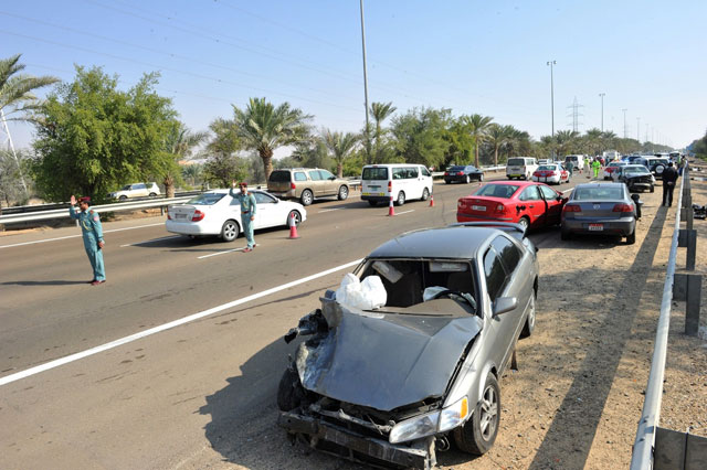 Police controlling traffic after the accident on Abu Dhabi-Al Ain Road on Thursday morning.