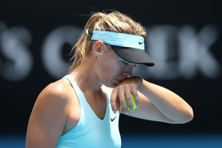 Maria Sharapova of Russia reacts to a point in her fourth round match against Dominika Cibulkova of Slovakia during day eight of the 2014 Australian Open at Melbourne Park on January 20, 2014 in Melbourne, Australia. (GETTY)