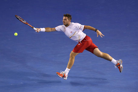 Stanislas Wawrinka of Switzerland plays a forehand in his men's final match against Rafael Nadal of Spain during day 14 of the 2014 Australian Open at Melbourne Park on January 26, 2014 in Melbourne, Australia. (GETTY)