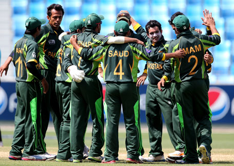 Pakistan players celebrate during the ICC U19 Cricket World Cup 2014 semifinal match between England and Pakistan at the Dubai International Stadium on February 24, 2014 in Dubai, UAE. (IDI/GETTY)
Copyright Notice - IDI 2014