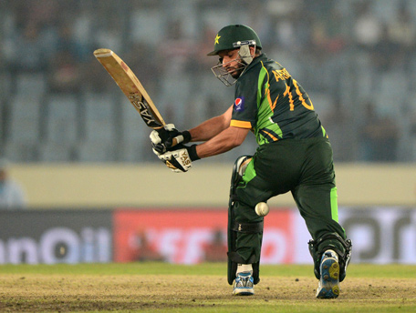 Pakistan batsman Shahid Afridi plays a shot during the sixth match of the Asia Cup one-day cricket tournament between India and Pakistan at the Sher-e-Bangla National Cricket Stadium in Dhaka on March 2, 2014. (AFP)