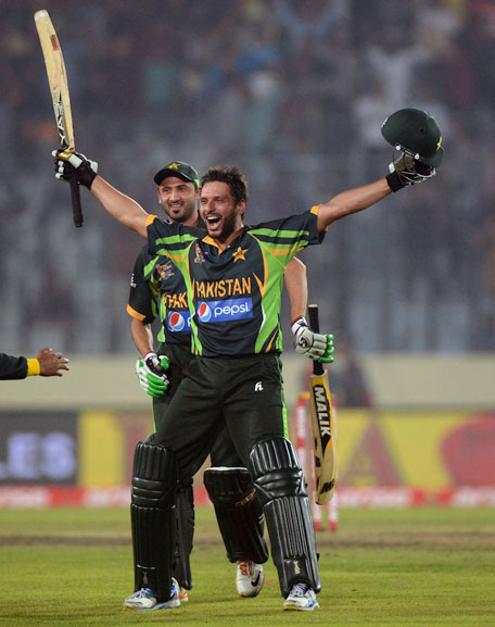 Pakistan batsman Shahid Afridi reacts after winning the sixth match of the Asia Cup one-day cricket tournament between India and Pakistan at the Sher-e-Bangla National Cricket Stadium in Dhaka on March 2, 2014. (AFP)