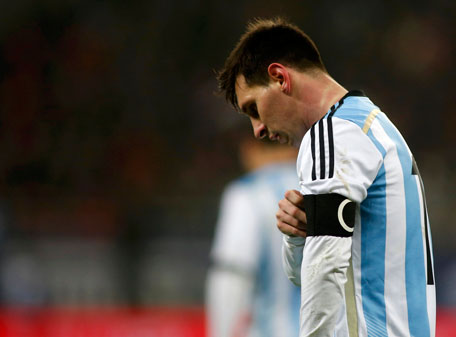 Argentina's Lionel Messi leaves the field at half time during their international friendly against Romania at the National Arena in Bucharest March 5, 2014. (REUTERS)