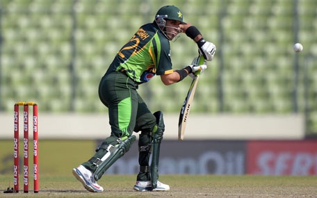 Pakistani batsman Misbah-ul-Haq plays a shot during the final of the Asia Cup one-day cricket tournament at the Sher-e-Bangla National Cricket Stadium in Dhaka on March 8, 2014. (AFP)