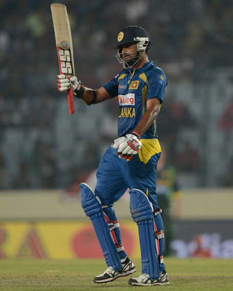 Sri Lankan batsman Lahiru Thirimanne reacts after scoring a half century during the final match of the Asia Cup one-day cricket tournament at the Sher-e-Bangla National Cricket Stadium in Dhaka on March 8, 2014. (AFP)