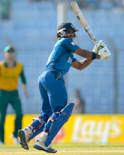 Kusal Perera hits a shot during the ICC World Twenty20 Group 1 match between Sri Lanka and South Africa at Zahur Ahmed Chowdhury Stadium on March 22, 2014 in Chittagong, Bangladesh. (GETTY)