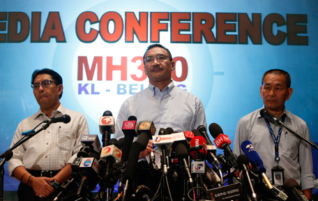Malaysia's acting Transport Minister Hishammuddin Hussein (C) speaks about the search for the missing Malaysia Airlines Flight MH370, during a news conference at Kuala Lumpur International Airport March 22, 2014. Chinese satellites have spotted objects floating in the southern search area for the missing aircraft that could be debris and has sent ships to investigate, Malaysia said on Saturday. Standing on the left is Department of Civil Aviation's Director General Azharuddin Abdul Rahman and on the right is Malaysia Airlines Chief Executive Officer Ahmad Jauhari Yahya.  (REUTERS)