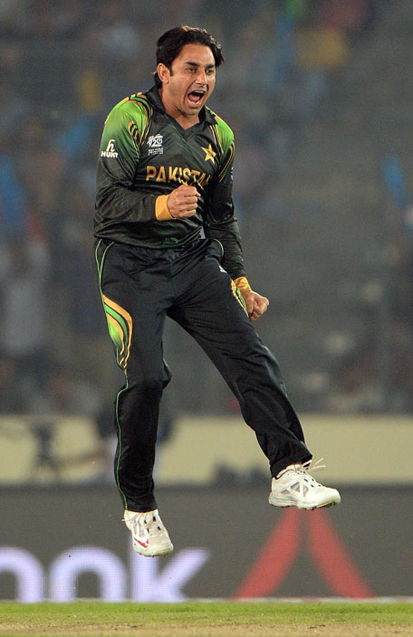 Pakistan bowler Saeed Ajmal celebrates after taking a wicket during the ICC World Twenty20 tournament match between India and Pakistan at the Sher-e-Bangla National Cricket Stadium in Dhaka on March 21, 2014.  (AFP)