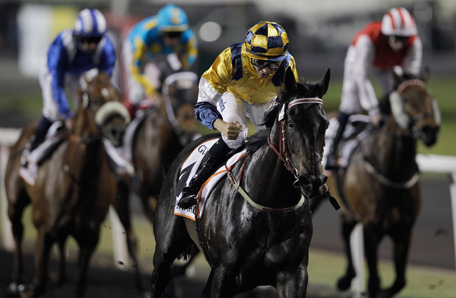 Sterling City from the Australia, front, ridden by Joao Moreira, crosses the finish line to win the Dubai Golden Shaheen horse race on the Dubai World Cup day at Meydan Racecourse in Dubai, United Arab Emirates, Saturday, March 29, 2014. (AP)