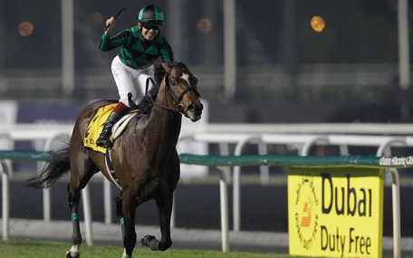 Just A Way from Japan ridden by Yuichi Fukunaga crosses the finish line to win the Dubai Duty Free horse race on the Dubai World Cup day at Meydan Racecourse in Dubai, United Arab Emirates, Saturday, March 29, 2014. (AP)