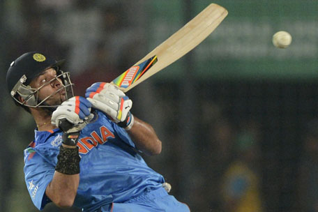 Indian batsman Yuvraj Singh plays a shot during the ICC World Twenty20 tournament Group 2 match between Australia and India at the Sher-e-Bangla National Cricket Stadium in Dhaka on March 30, 2014. (AFP)
