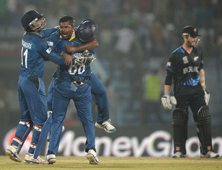 Rangana Herath celebrates dismissing Jimmy Neesham during the ICC World Twenty20 Bangladesh 2014 Group 1 match between Sri Lanka and New Zealand at Zahur Ahmed Chowdhury Stadium on March 31, 2014 in Chittagong, Bangladesh. (GETTY)