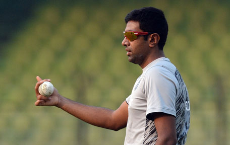 India cricketer Ravichandran Ashwin gestures as he bowls in nets at a training session during the ICC World Twenty20 tournament in the Khan Saheb Osman Ali Stadium at Fatullah in Dhaka on April 2, 2014. (AFP)
