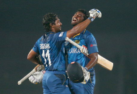 Kumar Sangakkara and Thisara Perera of Sri Lanka celebrates as Sri lanka win the Final of the ICC World Twenty20 Bangladesh 2014 between India and Sri Lanka at Sher-e-Bangla Mirpur Stadium on April 4, 2014 in Dhaka, Bangladesh. (GETTY)
