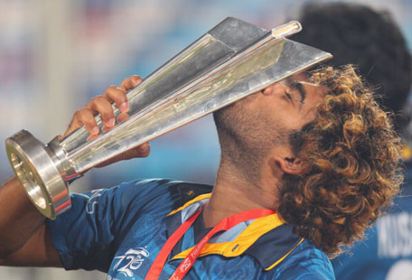 Lasith Malinga of Sri Lanka kisses the trophy after winning the Final of the ICC World Twenty20 Bangladesh 2014 between India and Sri Lanka at Sher-e-Bangla Mirpur Stadium on April 4, 2014 in Dhaka, Bangladesh. (GETTY)