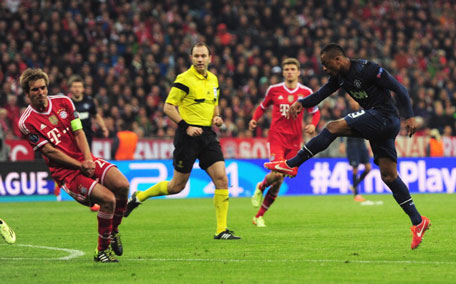 Patrice Evra of Manchester United scores his goal during the UEFA Champions League Quarter Final second leg match between FC Bayern Muenchen and Manchester United at Allianz Arena on April 9, 2014 in Munich, Germany. (GETTY)