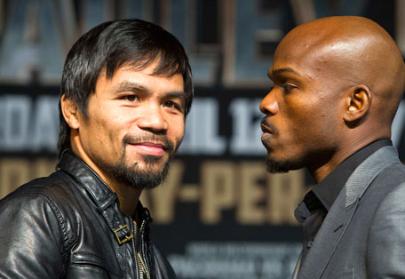 Boxer Manny Pacquiao (left) of the Philippines and undefeated WBO welterweight champion Timothy Bradley of the US pose during a news conference at the MGM Grand Hotel and Casino in Las Vegas, Nevada April 9, 2014. (REUTERS)
