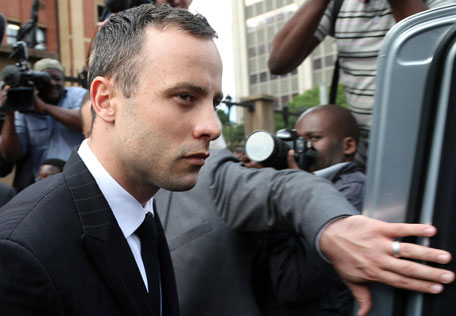 Oscar Pistorius leaves the high court in Pretoria, South Africa, Wednesday, April 9, 2014. Pistorius is charged with murder for the shooting death of his girlfriend, Reeva Steenkamp, on Valentines Day in 2013. (AP)