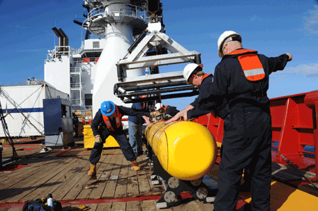 This handout image taken on April 1, 2014 and received on April 10, 2014 from the US Navy shows the Bluefin 21, Artemis autonomous underwater vehicle (AUV) being hoisted back aboard the Royal Australian Navy Australian Defense Vessel (ADV) Ocean Shield after a successful buoyancy test.  Joint Task Force 658 is supporting Operation Southern Indian Ocean, searching for the missing Malaysia Airlines flight MH370.  The hunt for more black box "pings" from missing Malaysian airliner MH370 was narrowing on April 10, 2014 to a specific patch of remote ocean after two more signals were detected.  (AFP)