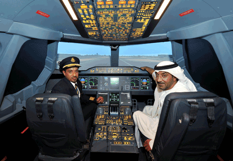 Sheikh Amhed takes the pilot seat with Capt Moataz Alswaini (Supplied)