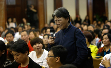 A relative of five passengers who were on board Malaysia Airlines flight MH370 cries before she speaks to Malaysian representatives during a briefing at Lido Hotel in Beijing April 21, 2014. A tropical cyclone was threatening to hamper the search for a missing Malaysian jetliner in a remote stretch of the Indian Ocean on Monday, as a submarine drone neared the end of its mission scouring the sea bed with still no sign of wreckage. (REUTERS)