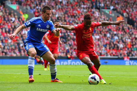 Cesar Azpilicueta of Chelsea marshalls Raheem Sterling of Liverpool during the Barclays Premier League match between Liverpool and Chelsea at Anfield on April 27, 2014 in Liverpool, England. (GETTY)
