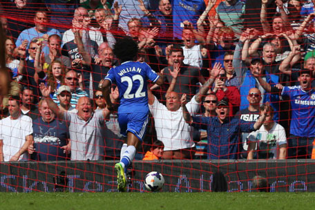 Willian of Chelsea scores their second goal during the Barclays Premier League match between Liverpool and Chelsea at Anfield on April 27, 2014 in Liverpool, England. (GETTY)
