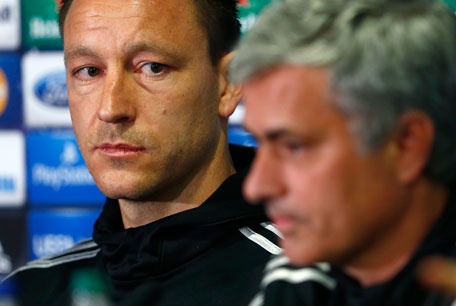 Chelsea's coach Jose Mourinho (right) and captain John Terry attend a media conference at Stamford Bridge in London April 29, 2014. (REUTERS)