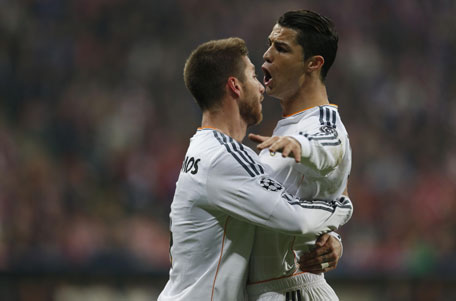 Real Madrid's Cristiano Ronaldo celebrates with Sergio Ramos (left) after scoring a goal against Bayern Munich during their Champion's League semi-final second leg soccer match in Munich April 29, 2014. (REUTERS)