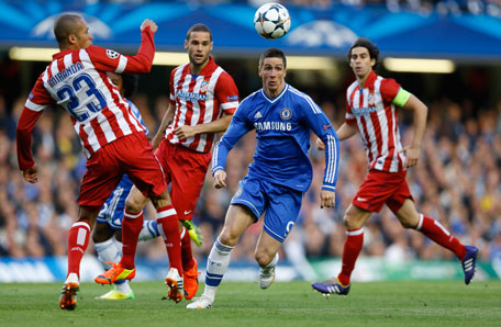 Chelsea's Fernando Torres (centre) tries to get through the Atletico defence during the Champions League semifinal second leg soccer match between Chelsea and Atletico Madrid at Stamford Bridge Stadium in London Wednesday, April 30, 2014. (AP)