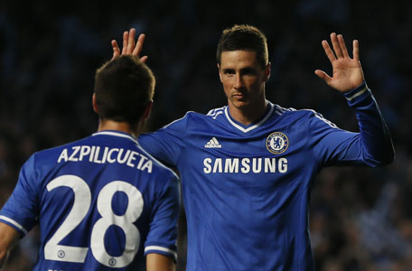 Chelsea's Fernando Torres is congratulated by Cesar Azpilicueta (left) after scoring a goal against Atletico Madrid during their Champion's League semi-final second leg soccer match at Stamford Bridge in London April 30, 2014. (REUTERS)