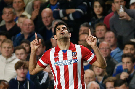 Atletico Madrid's Diego Costa celebrates after scoring from a penalty during their Champions League semi-final second leg soccer match against Chelsea at Stamford Bridge Stadium in London April 30, 2014. (REUTERS)