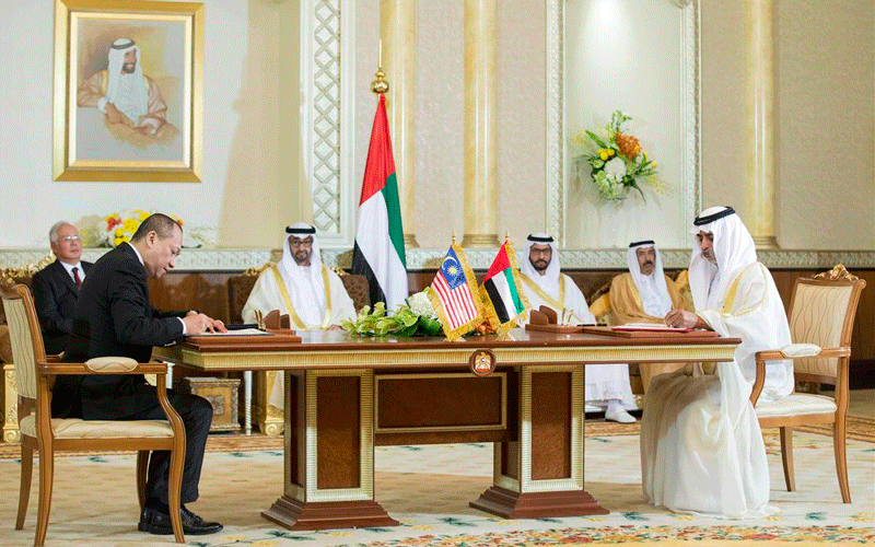 Several MoUs between UAE and Malaysian were signed in the presence of Dato Sri Mohammed Najib Bin Tun Abdul Razak, Prime Minister of Malaysia (back left) and General Sheikh Mohamed bin Zayed Al Nahyan, Crown Prince of Abu Dhabi and Deputy Supreme Commander of the UAE Armed Forces (back third left), in Abu Dhabi on Sunday. (Wam)