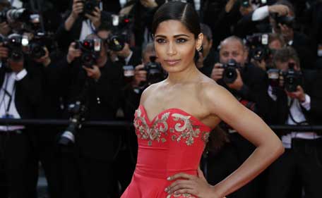 Actress Freida Pinto poses as she arrives for the screening of the film "The Homesman" at the 67th edition of the Cannes Film Festival in Cannes, southern France, on May 18, 2014. (AFP)