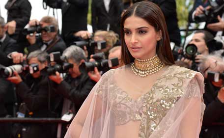 Indian actress Sonam Kapoor poses as she arrives for the screening of the film "Foxcatcher" at the 67th edition of the Cannes Film Festival in Cannes, southern France, on May 19, 2014. (AFP)