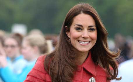 Catherine, Duchess of Cambridge, known as the Earl and Countess of Strathearn in Scotland, smiles during a visit to Strathearn Community Campus in Crieff, 20 kms west of Perth, Scotland on May 29, 2014. (AFP)