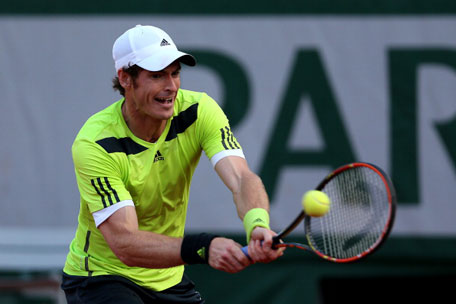 Andy Murray of Great Britain returns a shot during his men's singles quarter-final match against Gael Monfils of France on day eleven of the French Open at Roland Garros on June 4, 2014 in Paris, France. (GETTY)