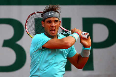 Rafael Nadal of Spain returns a shot during his men's singles quarter-final match against David Ferrer of Spain on day eleven of the French Open at Roland Garros on June 4, 2014 in Paris, France. (GETTY)
