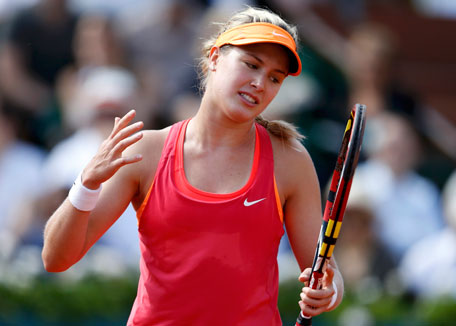 Eugenie Bouchard of Canada reacts during her women's semi-final match against Maria Sharapova of Russia at the French Open tennis tournament at the Roland Garros stadium in Paris June 5, 2014. (REUTERS)