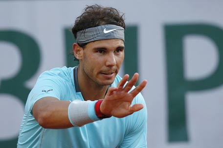 Rafael Nadal gestures during his French tennis Open quarter final match against Spain's David Ferrer at the Roland Garros stadium in Paris. (AFP)