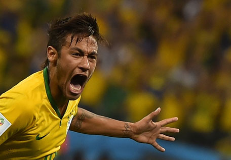 Brazil's forward Neymar celebrates scoring during a Group A football match between Brazil and Croatia at the Corinthians Arena in Sao Paulo during the 2014 FIFA World Cup on June 12, 2014. (AFP)