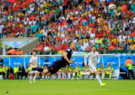 Netherlands' Robin van Persie scores a goal during the group B World Cup soccer match between Spain and the Netherlands at the Arena Ponte Nova in Salvador, Brazil, Friday, June 13, 2014. (AP)
