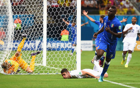 Mario Balotelli of Italy celebrates after scoring the second goal during the 2014 FIFA World Cup Brazil Group D match between England and Italy at Arena Amazonia on June 14, 2014 in Manaus, Brazil. (GETTY)