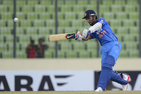 Indian cricketer Ajinkya Rahane plays a shot during the one day international between India and Bangladesh at the Sher-e-Bangla National Cricket Stadium in Dhaka on June 15, 2014. (AFP)