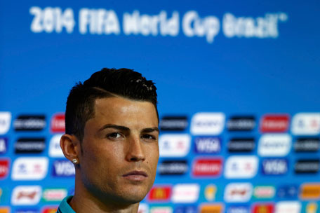 Portugal's national soccer team player Cristiano Ronaldo attends a news conference at the Arena Fonte Nova stadium in Salvador, June 15, 2014. (REUTERS)
